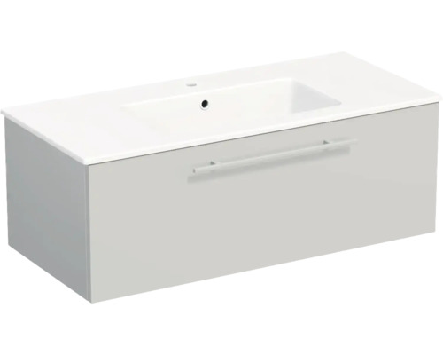 Meuble sous-vasque gris clair avec un tiroir et lavabo en céramique blanc. Design rectangulaire avec une longue poignée horizontale.