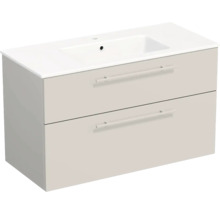 Meuble sous-vasque moderne beige avec deux tiroirs et vasque blanche intégrée.