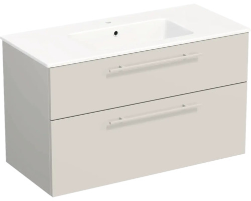 Meuble sous-vasque moderne beige avec deux tiroirs et vasque blanche intégrée.