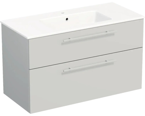 Meuble sous-vasque moderne avec lavabo en céramique intégré et deux tiroirs munis de fines poignées horizontales.