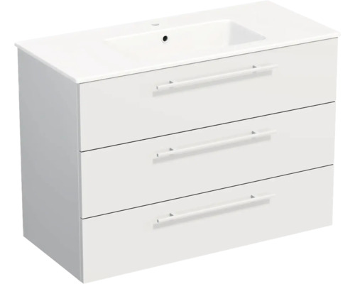 Meuble sous-vasque blanc avec trois tiroirs et vasque intégrée.