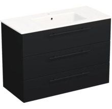 Meuble sous-vasque noir avec trois tiroirs et vasque intégrée blanche.