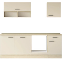 Cuisine équipée moderne avec éléments hauts, éléments bas et une niche pour appareils encastrables en décor bois clair.
