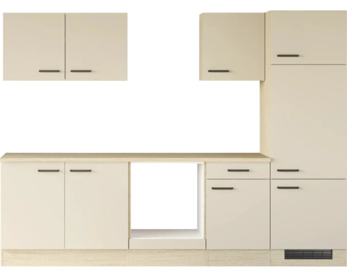 Cuisine équipée moderne avec placards muraux, meubles bas, niche pour appareils électroménagers et plan de travail au design intemporel.