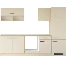 Cuisine équipée moderne avec placards hauts et bas incluant une niche pour appareils électroménagers au design épuré.