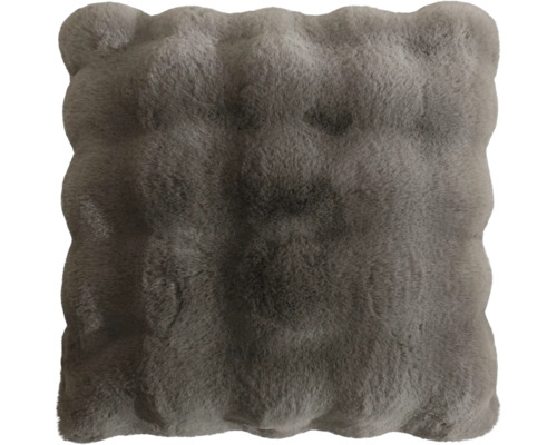 Coussin carré capitonné en fausse fourrure douce avec bord ondulé.