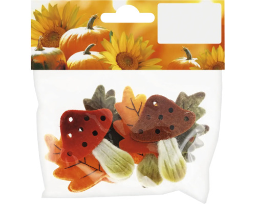 Set mit herbstlichen Deko Figuren wie Filzpilze und Blätter in einer Kunststoffverpackung zur Dekoration.