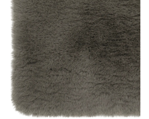 Tapis en fausse fourrure douce avec une texture dense en version unie