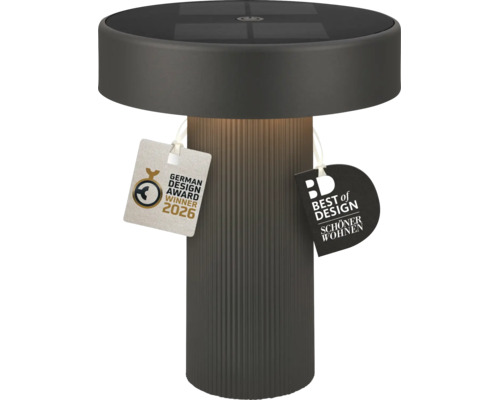 Moderne LED Solar Tischleuchte mit geripptem Fuß und Solarpanel auf der Oberseite, inklusive German Design Award 2026 Auszeichnung.