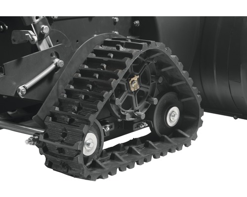 Detailaufnahme einer Kettenraupe an einer Schneefräse.