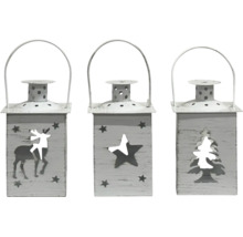 Trois lanternes rectangulaires en métal pour bougies chauffe-plat avec des motifs découpés de renne, étoile et sapin et une poignée.