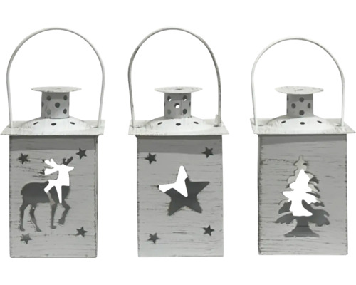 Trois lanternes rectangulaires en métal pour bougies chauffe-plat avec des motifs découpés de renne, étoile et sapin et une poignée.