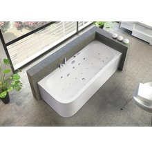Baignoire balnéo dans une salle de bain avec des plantes