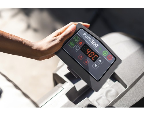 Nahaufnahme der Steuerung eines PureSpa Whirlpools mit Temperaturanzeige von 40 Grad.
