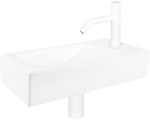 Waschtisch aus Keramik mit Armatur