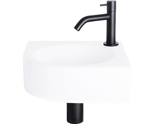 Vasque à poser blanche avec robinet noir pour la salle de bains