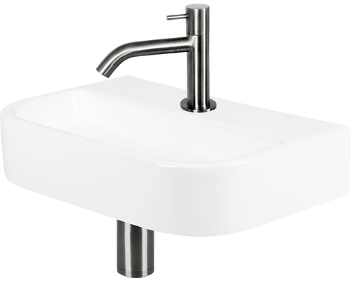Lavabo en céramique avec robinetterie et siphon