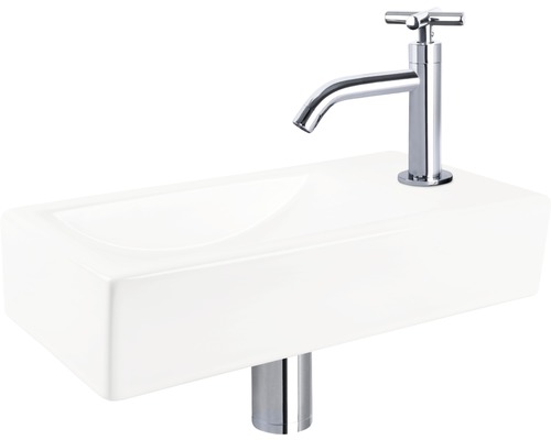 Waschbecken aus Keramik mit Armatur