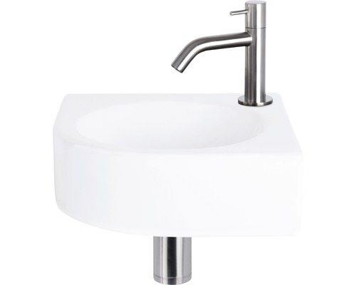 Weisses Keramik-Waschbecken mit Armatur