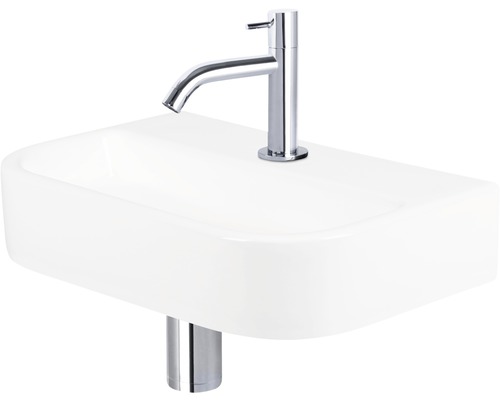 Waschbecken aus Keramik mit Armatur