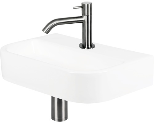 Waschtisch mit Armatur aus Sanitärkeramik und Metall