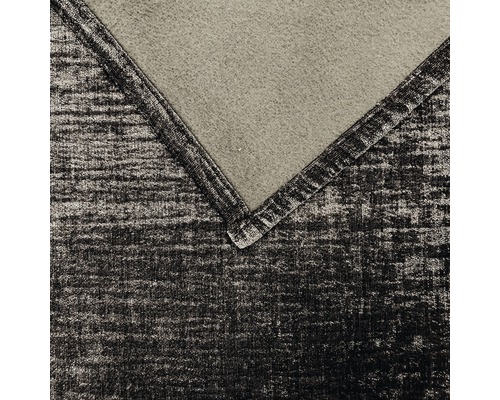 Gros plan d''une couverture en polaire avec motif