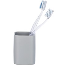 Brosses à dents dans un gobelet pour brosses à dents