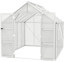 Serre avec portes ouvertes et fenêtre pour la ventilation