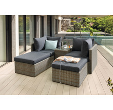 Ensemble de salon de jardin en rotin avec coussins sur une terrasse