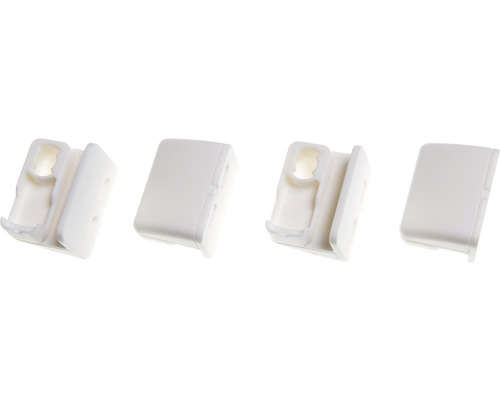 Vier Kunststoffhalterungen für Möbelverbinder