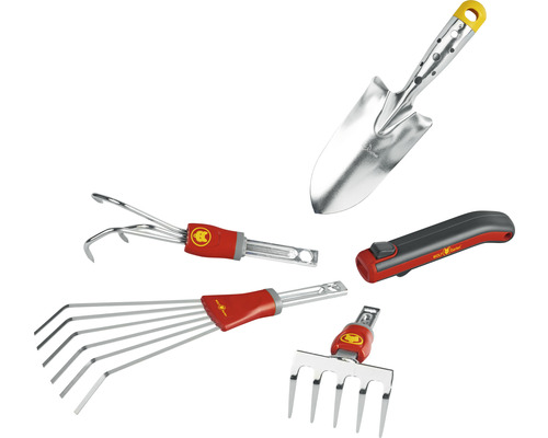 Divers outils de jardin tels qu''une pelle, un désherbeur, un balai à gazon, un cultivateur et un couteau.