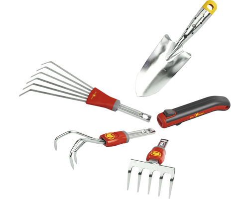 Ensemble d''outils de jardin comprenant râteau, pelle, cultivateur et couteau