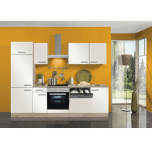 Cuisine moderne avec appareils intégrés et façades claires devant un mur coloré