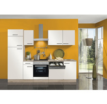 Cuisine moderne avec armoires blanches, hotte aspirante et appareils électriques devant un mur jaune