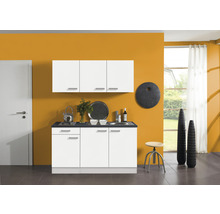 Cuisine avec armoires blanches, plan de travail foncé et décorations modernes