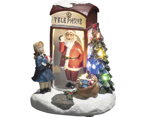 Dekorative Weihnachtsszene mit Weihnachtsmann in Telefonzelle, Mädchen und Weihnachtsbaum mit Beleuchtung