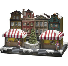 Weihnachtsmarktszene mit beleuchteten Häusern und Figuren