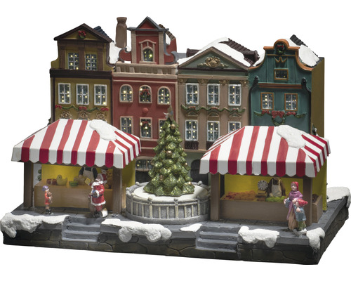 Weihnachtsmarktszene mit beleuchteten Häusern und Figuren