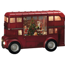 Autobus rouge décoratif à impériale avec le père Noël, un enfant et un sapin de Noël à l''intérieur