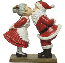 Figurine décorative du Père Noël et de la Mère Noël s''embrassant sur un socle