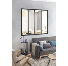 Salon avec canapé, fauteuil, table d''appoint et miroir mural de style industriel