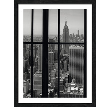 Photographie en noir et blanc de New York avec vue sur l''Empire State Building dans un cadre