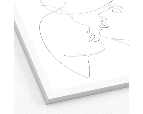 Affiche encadrée avec un dessin au trait de deux visages se faisant face