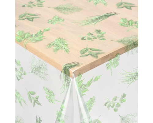 Nappe Crystal herbes vert 140 cm de large (au mètre) Nappe transparente à motifs d''herbes aromatiques sur une table en bois