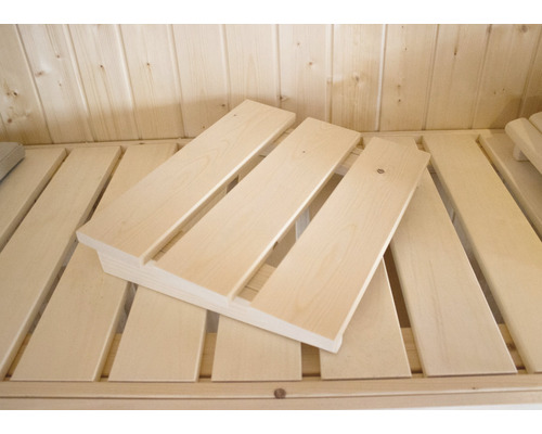 Sauna en bois avec couchette et appui-nuque