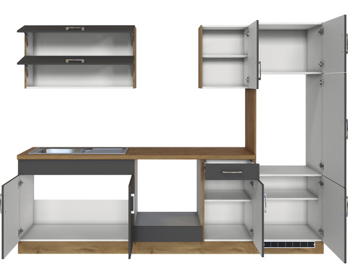 Cuisine équipée avec évier, tiroirs et placards avec portes ouvertes