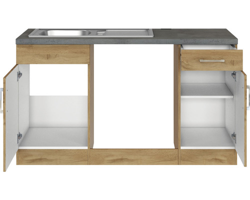 Cuisine équipée avec évier, tiroir et espace de rangement derrière les portes