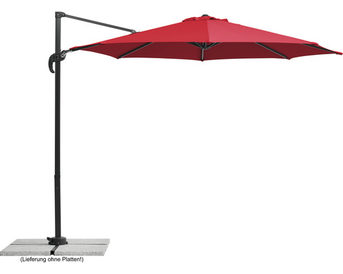 Parasol excentré rouge sur un socle en pierre grise