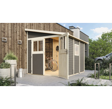 Abri de jardin avec porte ouverte, vélo et outils de jardin