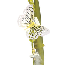 Bougie de Pâques décorée avec motif papillon